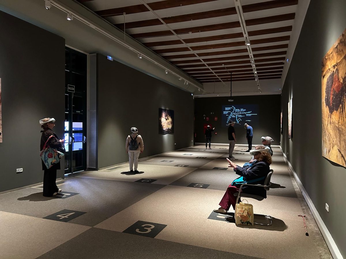 The exhibition’s virtual reality room, where visitors wearing headsets explore the cave